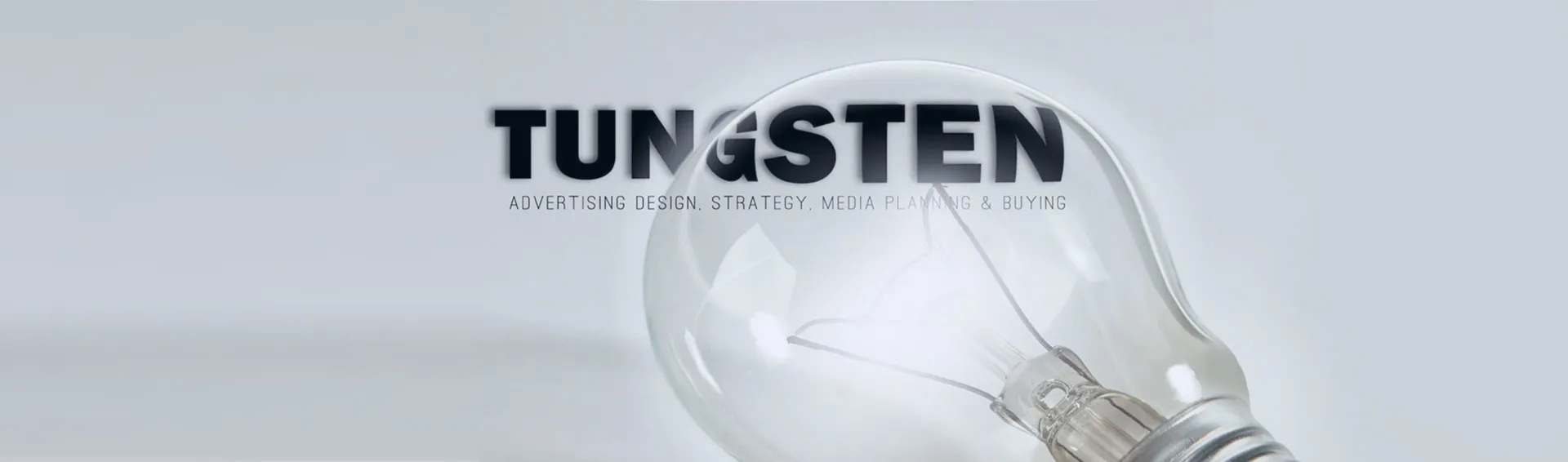 Glowing lightbulb with filament made of tungsten